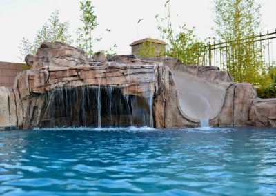 Pool-features-artificial-rock-work-slide-grotto-vegas-1-71