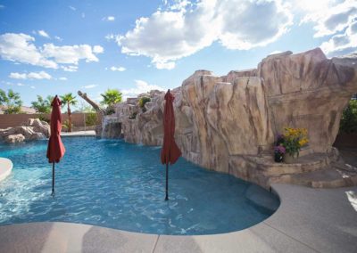 Pool-features-artificial-rock-work-slide-tree-swing--grotto-umbrellas-vegas-1-23-9