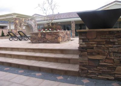Pool-features-artistic-paver-fire-pit-stoned-planter-vegas-1-60