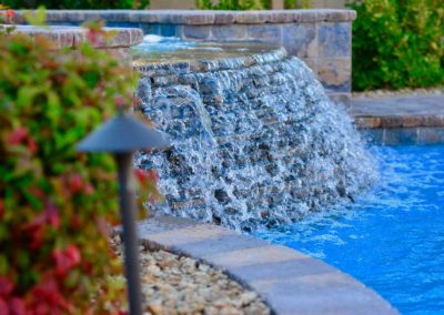 Pool-features-pavers-stacked-stone-spa-spillover-spa-vegas-1-109