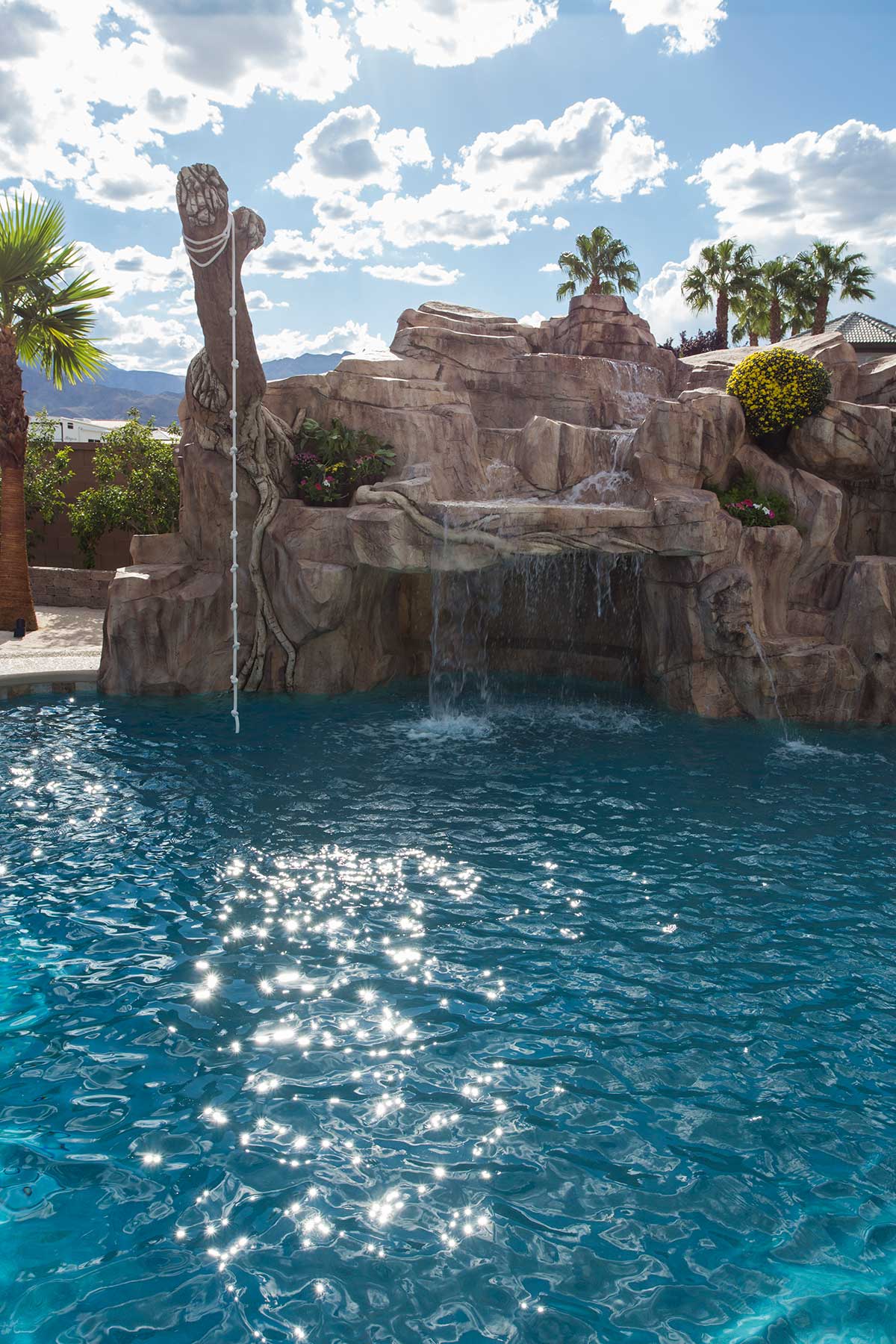 Pool-features-rope-swing-artificial-rock-work-grotto-artificial