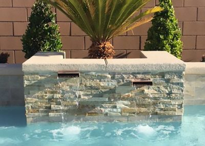 Pool-features-stone-on-pool-copper-scuppers-vegas-1-47