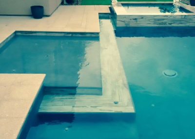 Pool-features-tiled-step-wet-deck-pebble-tec-vegas-1-49
