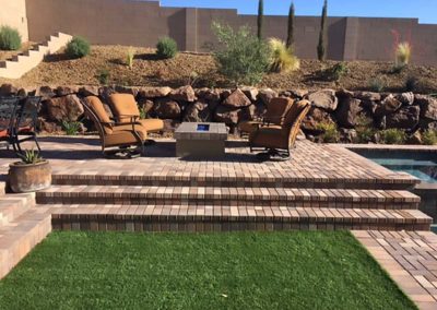 Outdoor-Living-turf-pavers-fire-pit-seating-area-vegas-1-52