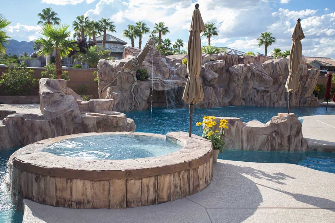 Pool-features-artificial-rock-work-slide-tree-swing--grotto-spa-barrel ...